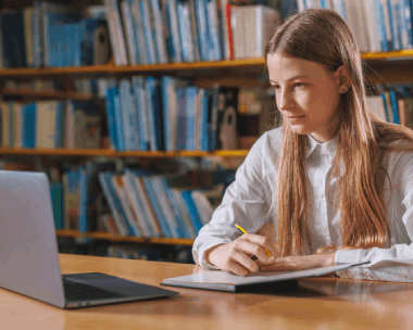 Student using Academic translation services by accessing translated academic content across classrooms and offices.