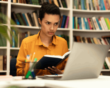 Student using Academic translation services to understand and submit translated academic research and study records.