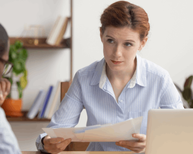 An ATA-certified linguist proofreads a certified USCIS translation, representing Polish Translation Services in Illinois.