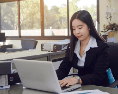 A certified linguist stamps and reviews an affidavit, providing Chinese Translation in Illinois for legal certification.