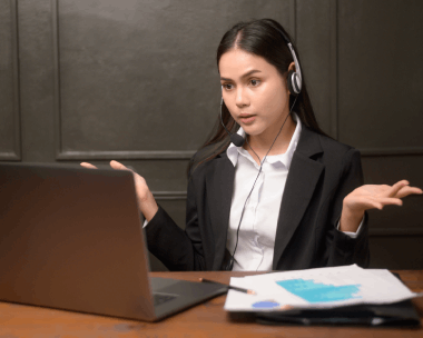 A bilingual consultant leads a cross-sector client call, explaining how Translation Services in Evanston keep global teams.