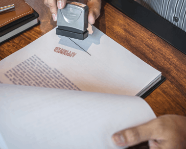 A certified translation is stamped and signed for immigration, highlighting Translation Services in Chicago for legal.