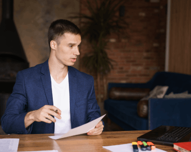 An Evanston attorney reviews a translated contract with a client, highlighting legal accuracy from Translation Services.