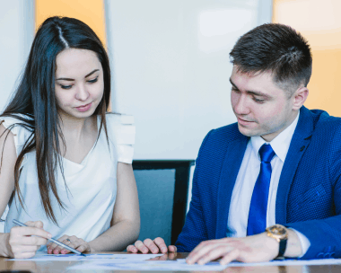 A client signs a translated legal contract in a law office, relying on Translation Services in Skokie for court-ready docs.