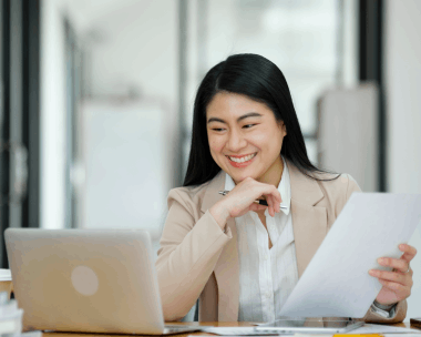 A certified translator reviews a legal affidavit and birth certificate, providing Polish Translation Services in Illinois.