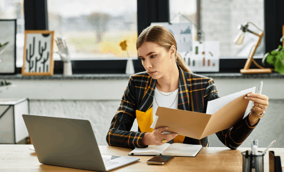 A native linguist proofreads a contract for error-free documents using Polish Translation Services in Illinois with secure.