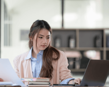 Translator ensuring secure handling of personal documents during the Birth Certificate translation process in Illinois.