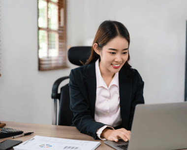 A translator reviews a bilingual style guide to deliver high-quality Spanish Translation Services in Illinois for clarity.