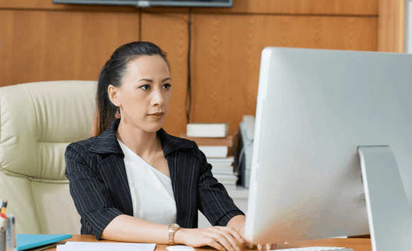 A translator reviews a legal contract for a client, delivering Spanish Translation Services in Illinois for legal.