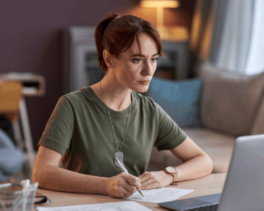 A client seals translated USCIS documents in an envelope, relying on Translation Services in Cicero for individuals.